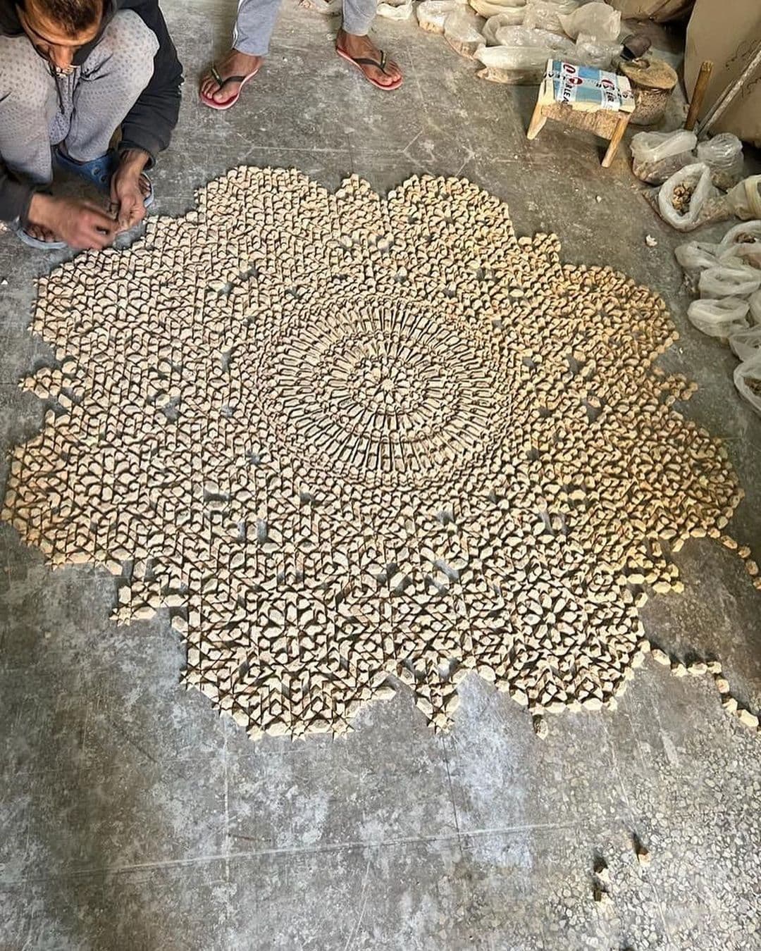 Expert craftsman handcrafting wholesale Zellige tiles in Fez, Morocco